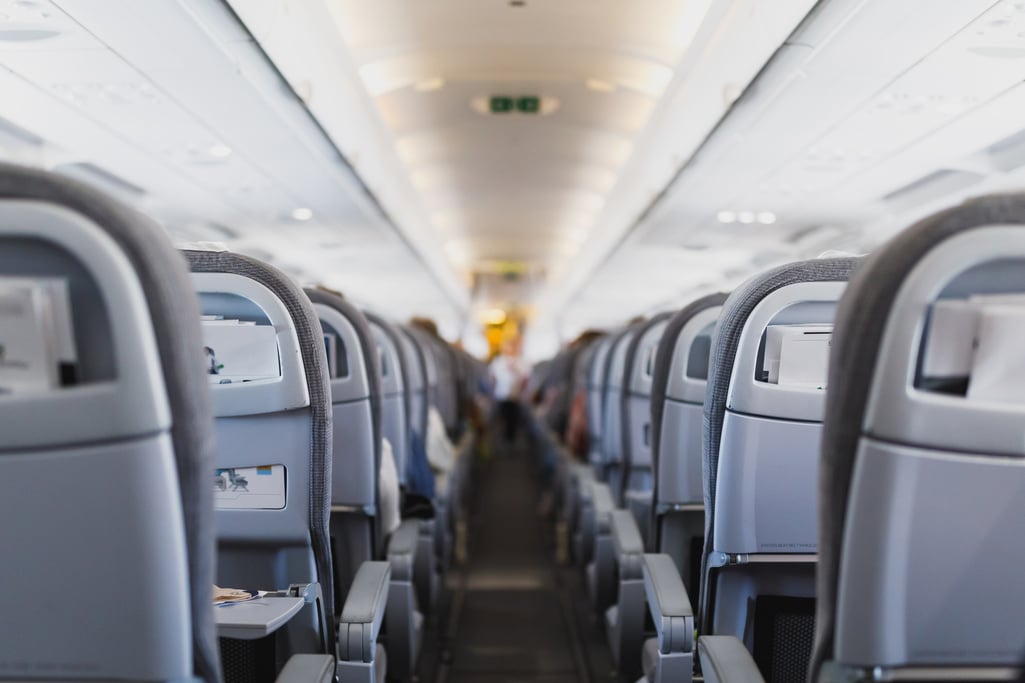 airline passenger seats and aisle